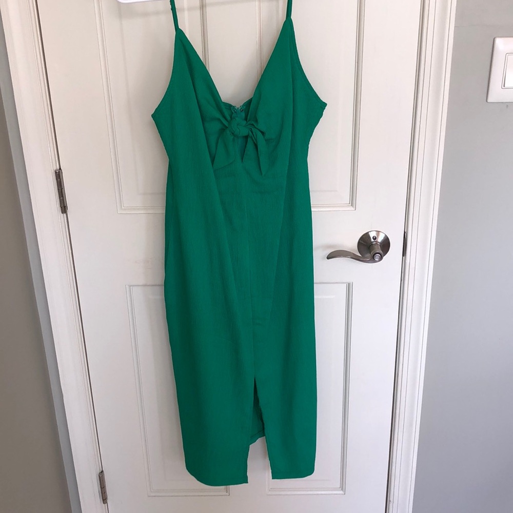 Worn once, green dress with bow in front